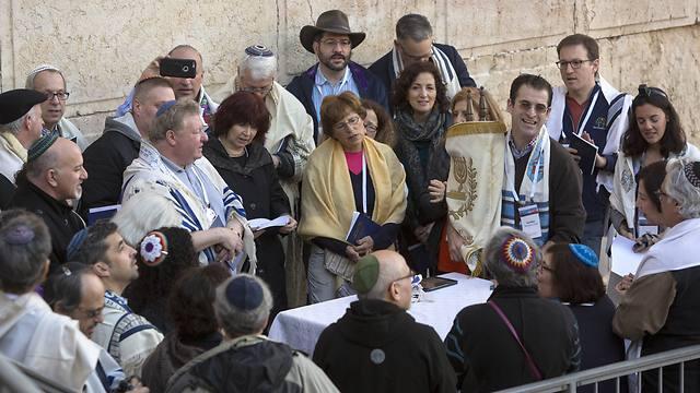 American Reform Rabbi, Zachary Shapiro, center right, and other American and Israeli Reform rabbis pray in the Western Wall (Associated Press) American Reform Rabbi, Zachary Shapiro, center right, and other American and Israeli Reform rabbis pray in the Western Wall