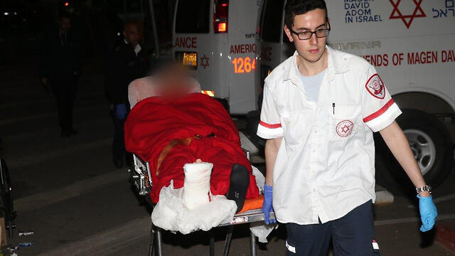 Wounded arrive back in Israel (Photo: Motti Kimchi)