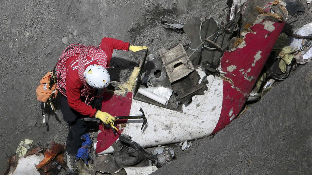 Debris being collected from the 2015 crash site in the French Alps (Photo: Reuters) Debris being collected from the 2015 crash site in the French Alps