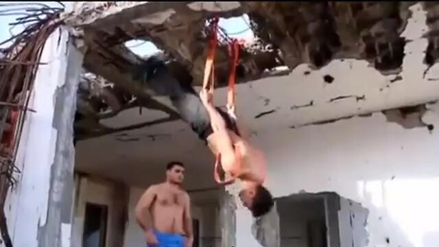 Gazans exercising in rubblenullnull Gazans exercising in rubble