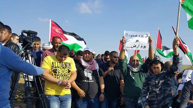 Palestinian flags at a Land Day protest in Umm al-Hirannullnull Palestinian flags at a Land Day protest in Umm al-Hiran