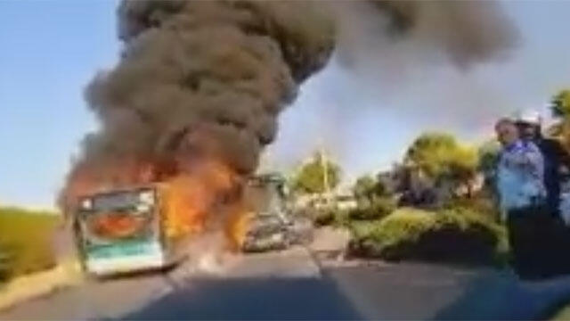 Bombing attack on Jerusalem bus (Photo: Arik Abuloff, Israeli firefighter department) (צילום: אריק אבולוף, כבאות והצלה ירושלים) Bombing attack on Jerusalem bus (Photo: Arik Abuloff, Israeli firefighter department)