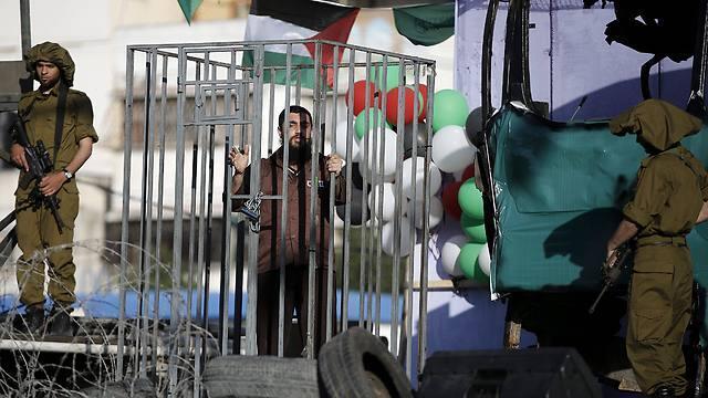 Actor portraying Palestinian detainee (Photo: EPA)