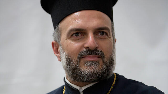 Father Gabriel Nadaf (צילום: AP) Father Gabriel Nadaf