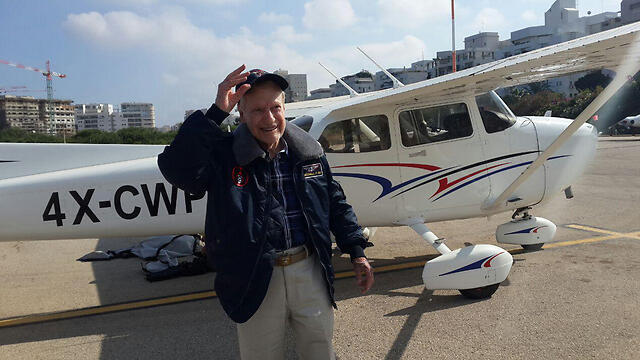 Mitchell Flint in front of the Cessna at Sde Dov Airport