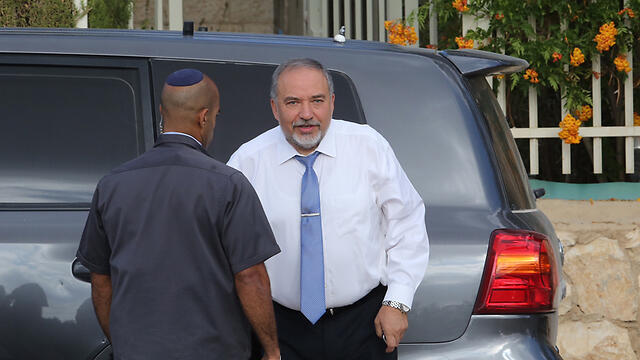 Lieberman this morning outside his home (Photo: Gil Yohanan)