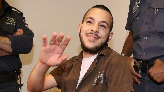 Террорист в зале суда. Фото: Эльад Гершон