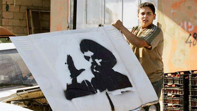 Hassan Nasrallah stencil (Photo: AP) (צילום: AP) Hassan Nasrallah stencil (Photo: AP)