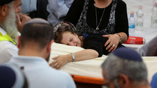 Shira Mark at her father's funeral 