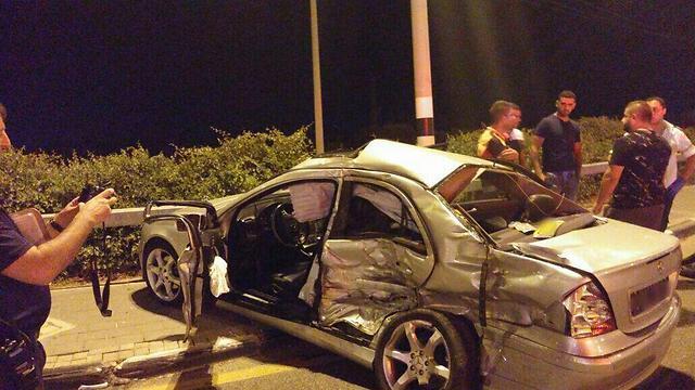 Vehicle after being struck by a truck at full speed (Photo: Magen David Adom) (צילום: דוברות מד"א) Vehicle after being struck by a truck at full speed (Photo: Magen David Adom)