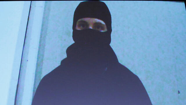 Ahron Driver in video promising imminent attack (Photo: Reuters)