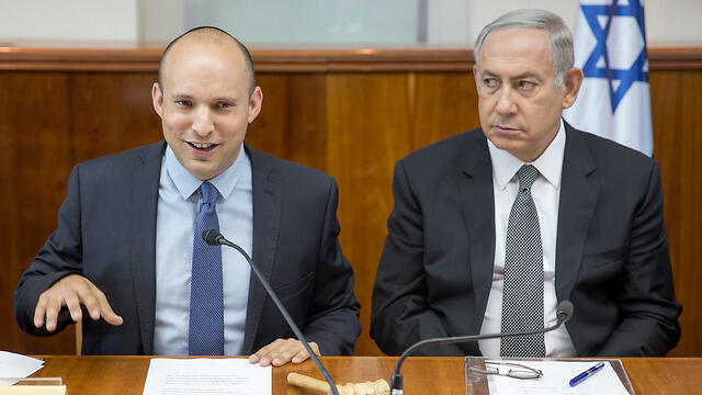Bennett and Netanyahu during a cabinet meeting (Photo: Emile Salman) (צילום: אמיל סלמן) Bennett and Netanyahu during a cabinet meeting (Photo: Emile Salman)