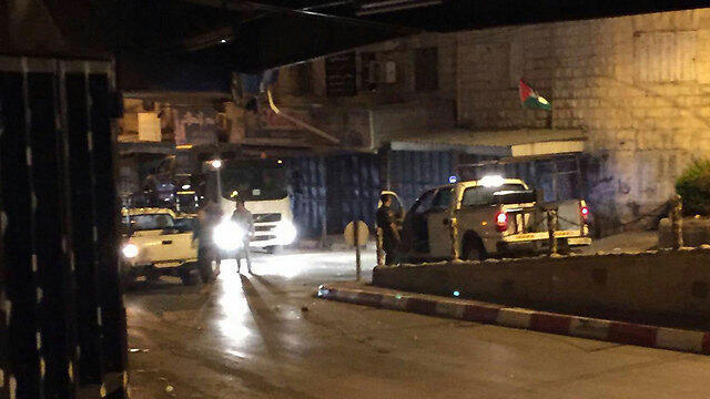 Two female soldiers pelted with rocks enar Tulkarm