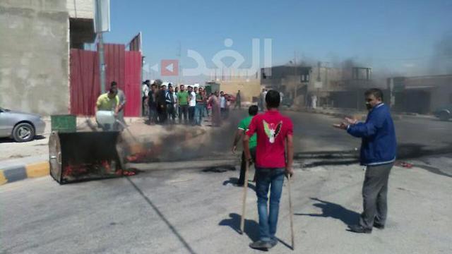 Amro family burning tires in protest Saturdaynullnull Amro family burning tires in protest Saturday