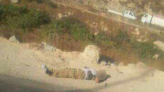 The terrorist after he was shot dead.nullnull The terrorist after he was shot dead.