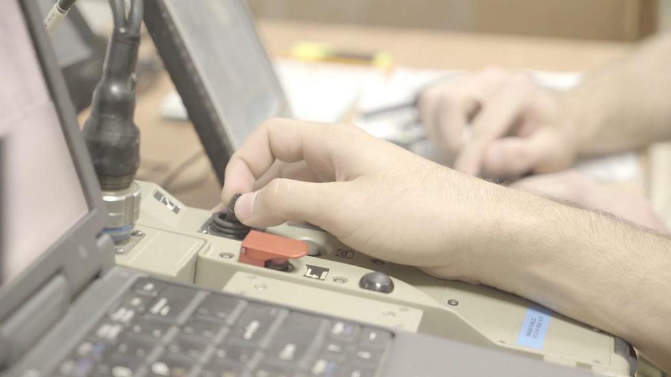 Controlling the drone using a tiny joystick (Photo: IDF Spokesman's Office)