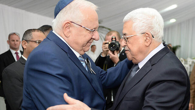 Abbas with President Reuven Rivlin at the funeral of Shimon Peres (Photo: Mark Neiman, GPO)