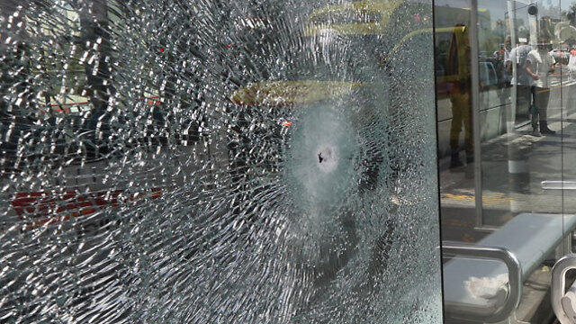 Light rail station glass sattered (Photo: Gil Yohanan)