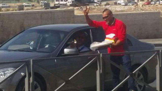 Distributing sweets after the attacknullnull Distributing sweets after the attack