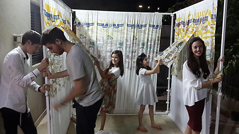 Building a sukkah with smiles
