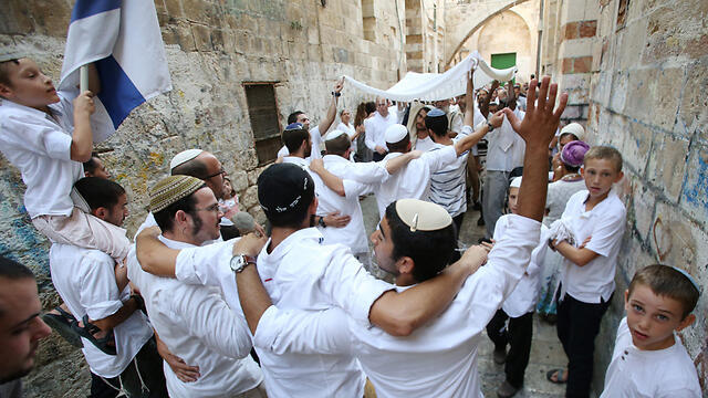Simchat Torah celebrations underway last year at te scene of a terror attack in Jerusalem (Photo: Shaul Golan)