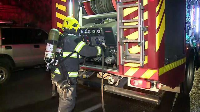 Firefighters in Haifa overnight (Photo: Avi Hai)