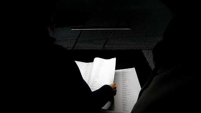 Visitors read names of those killed at Austria's Mauthausen concentration camp (Photo: Reuters) 