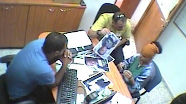 Police footage of a suspect during an interrogationnullnull Police footage of a suspect during an interrogation