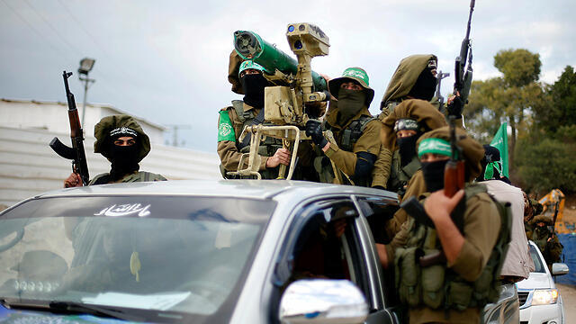 Hamas terrorists (Photo: Reuters) (צילום: רויטרס) Hamas terrorists (Photo: Reuters)