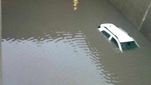 The sunk car in the flooded tunnel.nullnull The sunk car in the flooded tunnel.