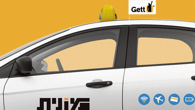 Такси с логотипом Gett