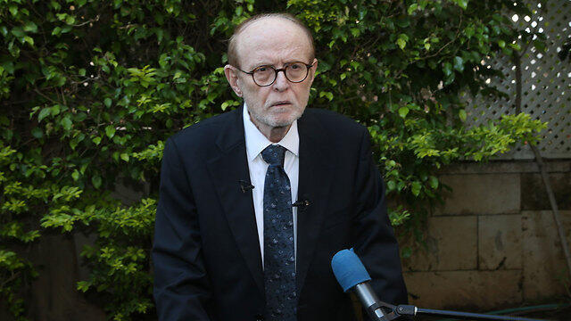 Yaakov Weinroth addresses the press