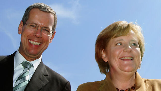 Robbe and Merkel (Photo: Gettyimages) (צילום: gettyimages) Robbe and Merkel (Photo: Gettyimages)