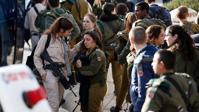 Soldiers shortly after the attack (Photo: AFP)