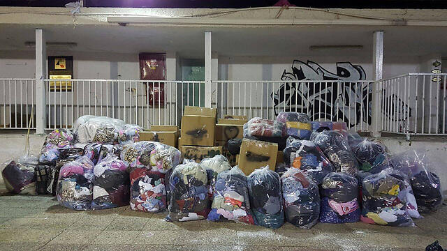 Bags of donated winter gear to be sent to Syrian refugees from Israeli citizens Photo: Youth Federation for Working and Studying