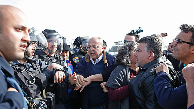 Arab MKs clashing with police (Photo: AFP)