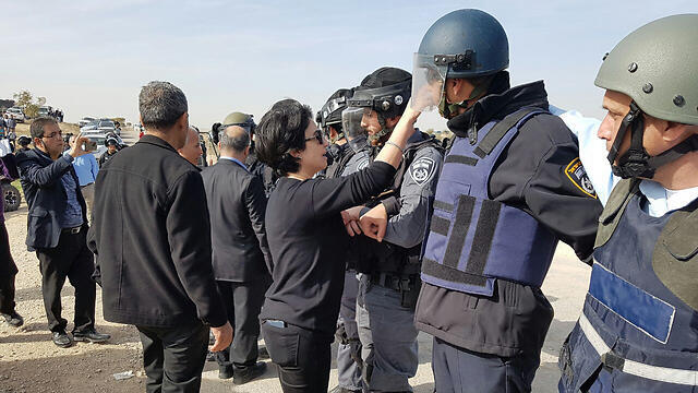 MK Zoabi, along with other Arab MKs, clashing with police (Photo: Israel Yosef)