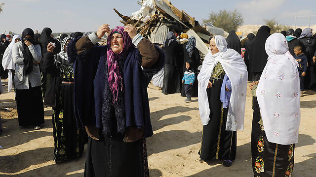 Umm al-Hiran residents following home demolition last week (Photo: AFP) (צילום: AFP) Umm al-Hiran residents following home demolition last week (Photo: AFP)