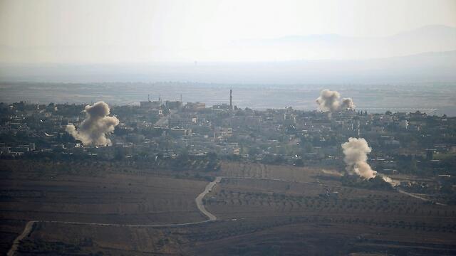Fighting in Syria as seen from the Israeli border (Photo: Reuters) (Reuters) Fighting in Syria as seen from the Israeli border (Photo: Reuters)
