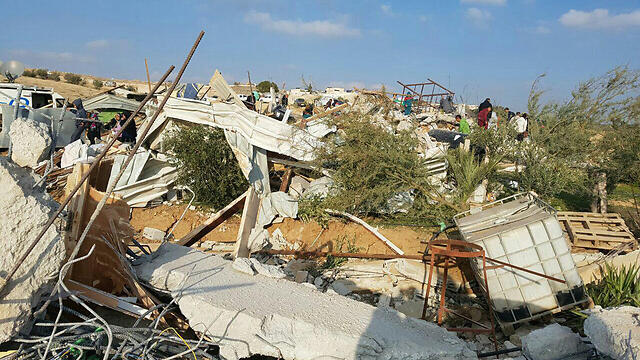 The demolished home in the village