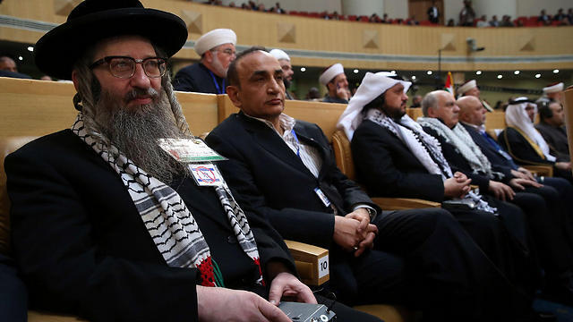 Rabbi Yisroel Dovid Weis at the conference (Photo: AFP)