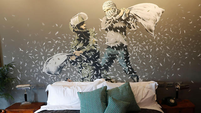 Palestinian and Israeli in pillow fight (Photo: AFP)