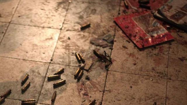 Shell cases and blood after the shootoutnullnull Shell cases and blood after the shootout