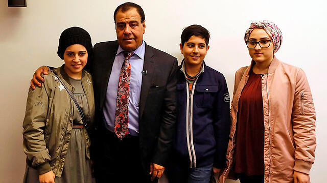 Dr. Abuelaish with members of his family (Photo: AFP) (צילום: AFP) Dr. Abuelaish with members of his family (Photo: AFP)