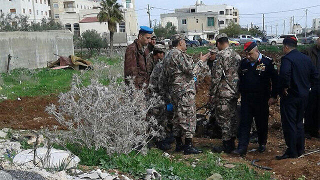 Officials inspecting the S-200 remains