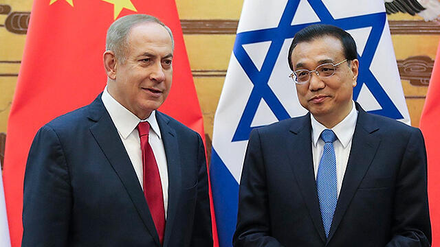 Netanyahu (L) and Li (Photo: EPA)
