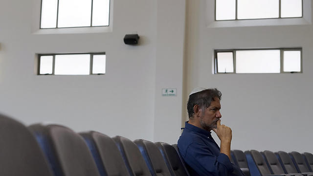 Franklin Perez, listens to a rabbi at a synagogue in Bogota, Colombia (Photo: AP) (Photo: AP) Franklin Perez, listens to a rabbi at a synagogue in Bogota, Colombia (Photo: AP)