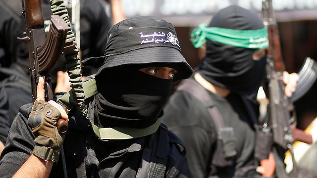 Hamas militants (Photo: Reuters) (צילום: רויטרס) Hamas militants (Photo: Reuters)