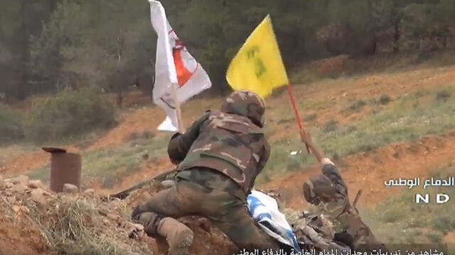 Militia soliders simulating taking over an Israeli post