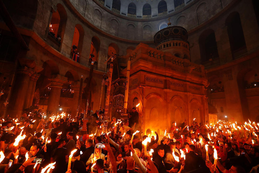 Worshippers inside the Church of the Holy Sepulchre (Photo: AFP) (Photo: AFP) Worshippers inside the Church of the Holy Sepulchre (Photo: AFP)